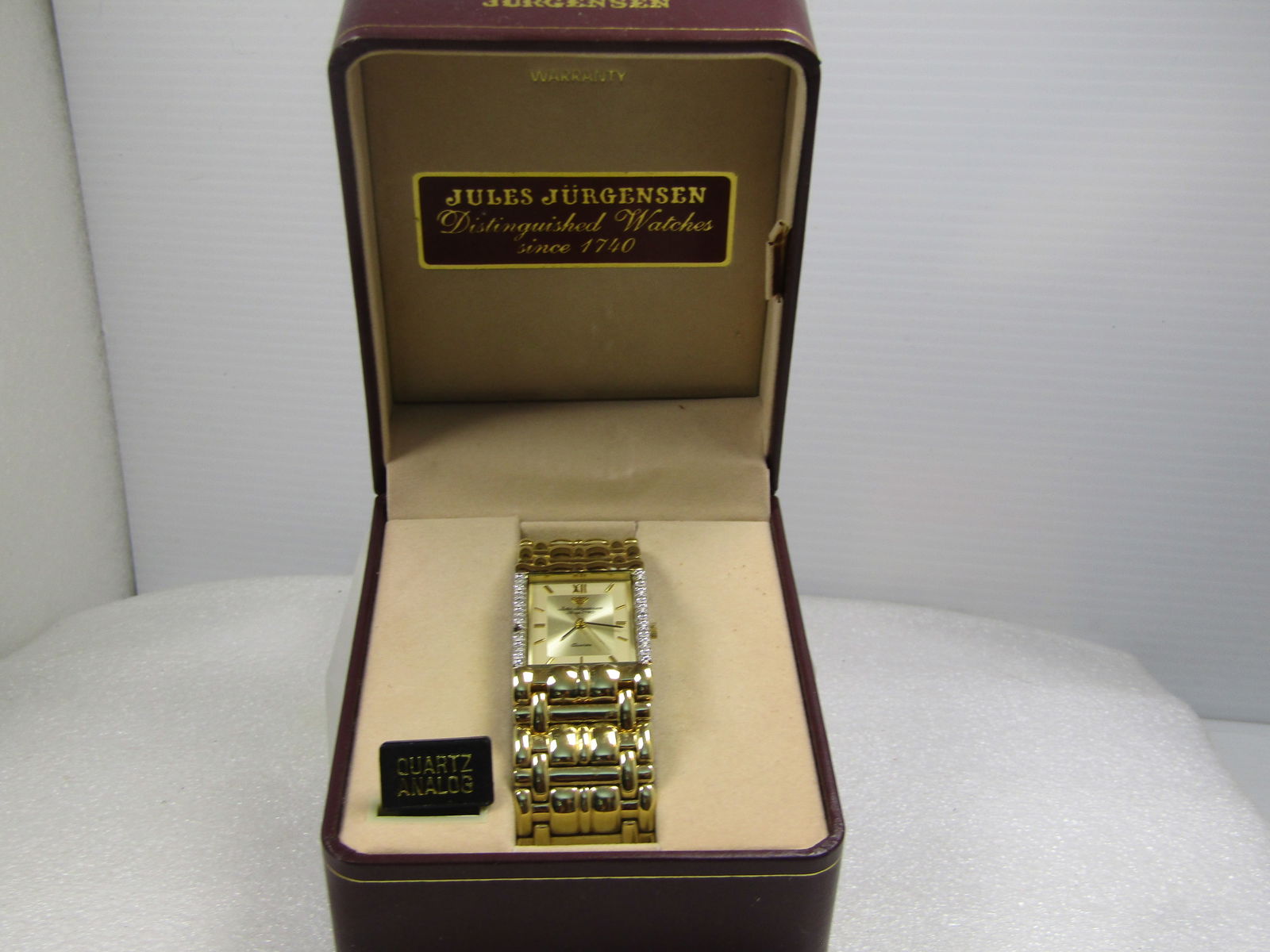 Jules Jurgensen Quartz Analog Ladie's Watch, Diamond Accent, Original Box/Tags.: Title:Jules Jurgensen Quartz Analog Ladie's Watch, Diamond Accent, Original Box/Tags. Description:Jules Jurgensen Quartz Analog Ladies's Watch, Diamond Accent, Original Box/Tags. From research, this i