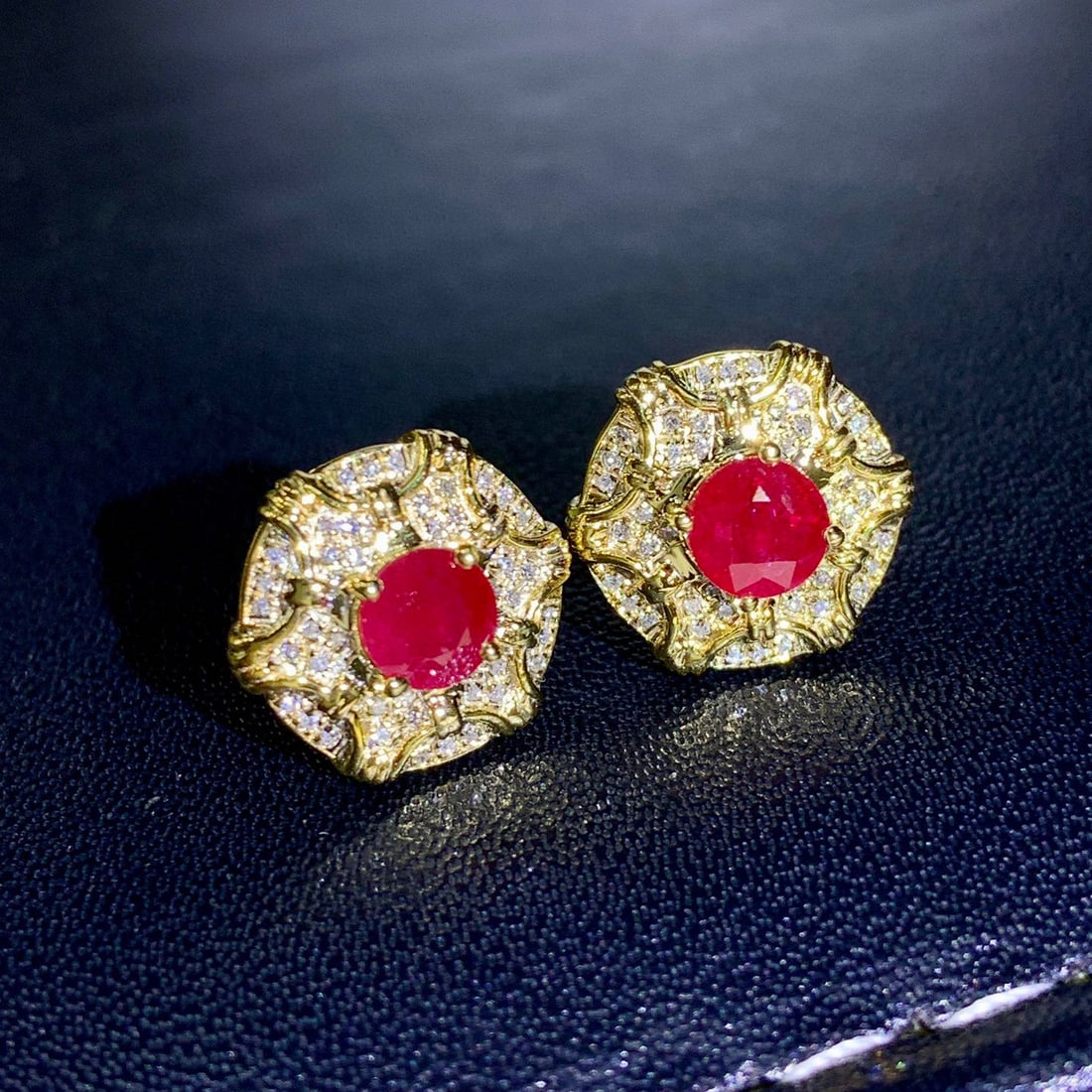 14K GOLD 1.10 CTW NATURAL RUBY & DIAMOND EARRINGS: Title:14K GOLD 1.10 CTW NATURAL RUBY & DIAMOND EARRINGSDescription:Ref:230528628Gold Content:14K GoldMain Gemstone:RubyNumber of stones:2Shape:RoundCarat Weight:0.93ct Color:RedTreatment:NaturalCut