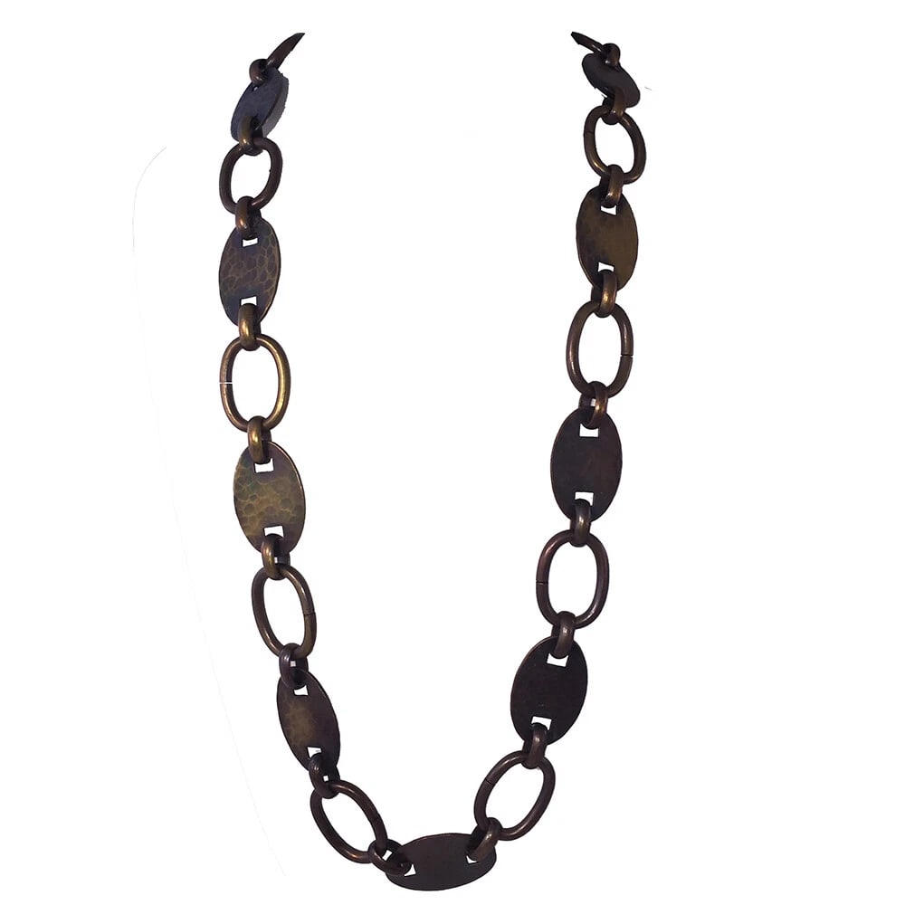 YSL Long Hammered Brass Mariner Link Necklace: Title:YSL Long Hammered Brass Mariner Link NecklaceDescription:Yves Saint Laurent hand hammered brass necklace made with mariner link design. Circa 2000's. Measures 32 1/2" by 1" wide. Closes with