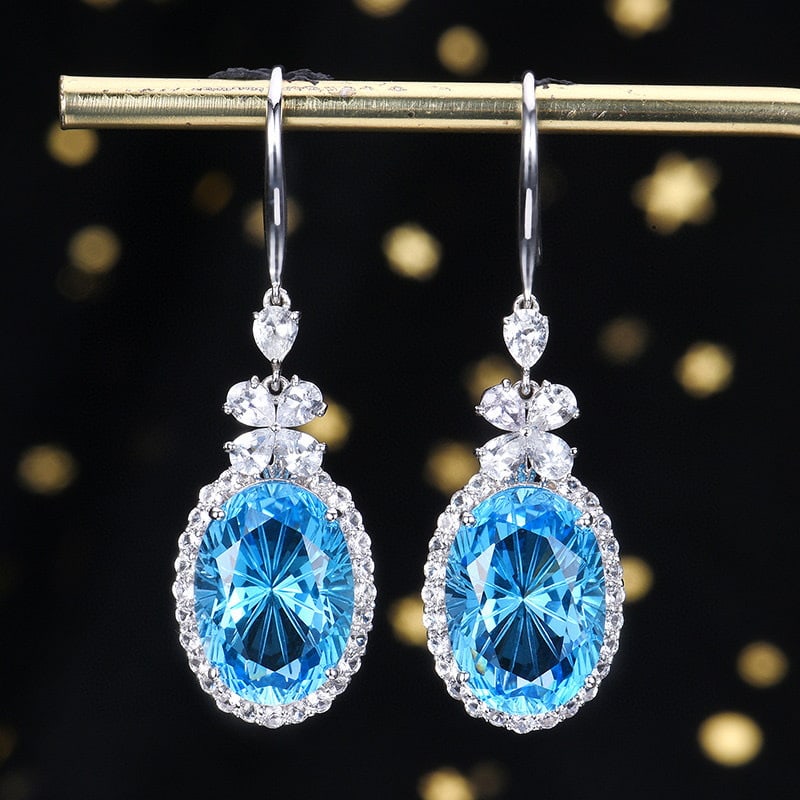 14K GOLD 14.20 CT NATURAL TOPAZ & SAPPHIRE & SAPPHIRE EARRINGS: Title:14K GOLD 14.20 CT NATURAL TOPAZ & SAPPHIRE & SAPPHIRE EARRINGS Description:Ref:230528607Gold Content:14K GoldMain Gemstone:TopazNumber of stones:2Shape:OvalCarat Weight:14.20ct Color:Swiss blueT