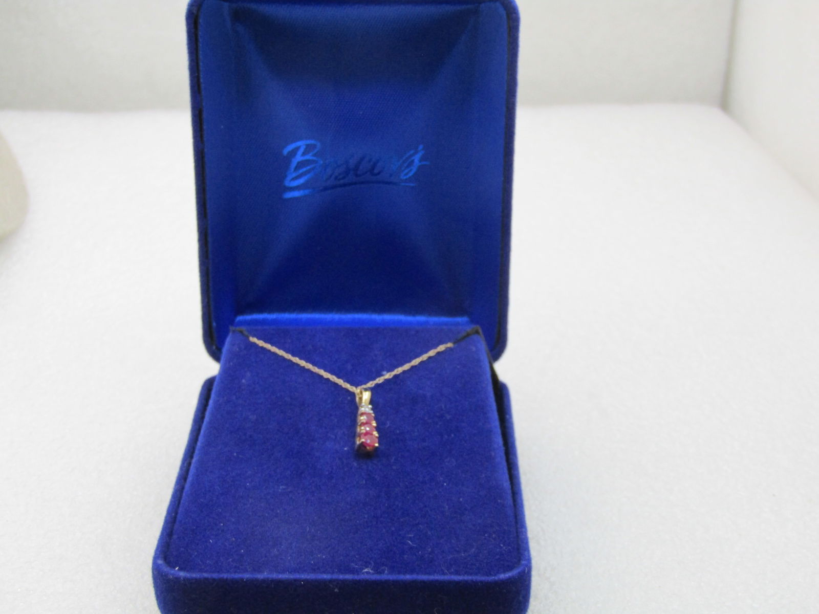 Vintage 14kt Ruby Diamond Journey Necklace, 18": Title:Vintage 14kt Ruby Diamond Journey Necklace, 18"Description:Vintage 14kt Ruby Diamond Journey Necklace, 18", signed with a diamond shape maker's mark, marked 14kt and tested. The pendant has