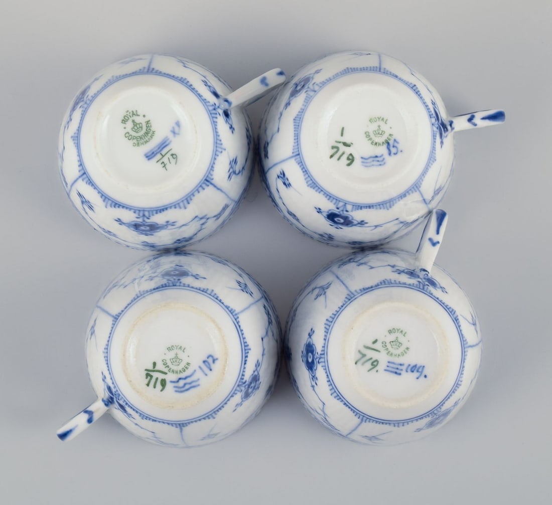 Royal Copenhagen Blue Fluted Half Lace. A set of four coffee cups with saucers. 1930s - 7
