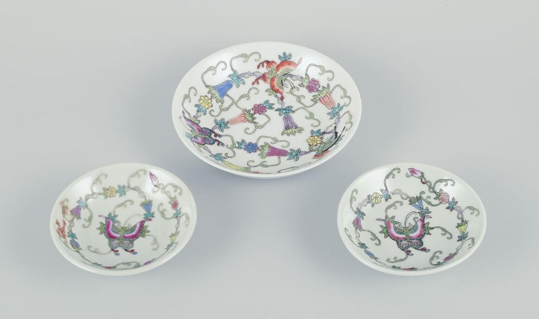China, three porcelain bowls. Classic motifs with flowers and butterflies. 20th C. - 2