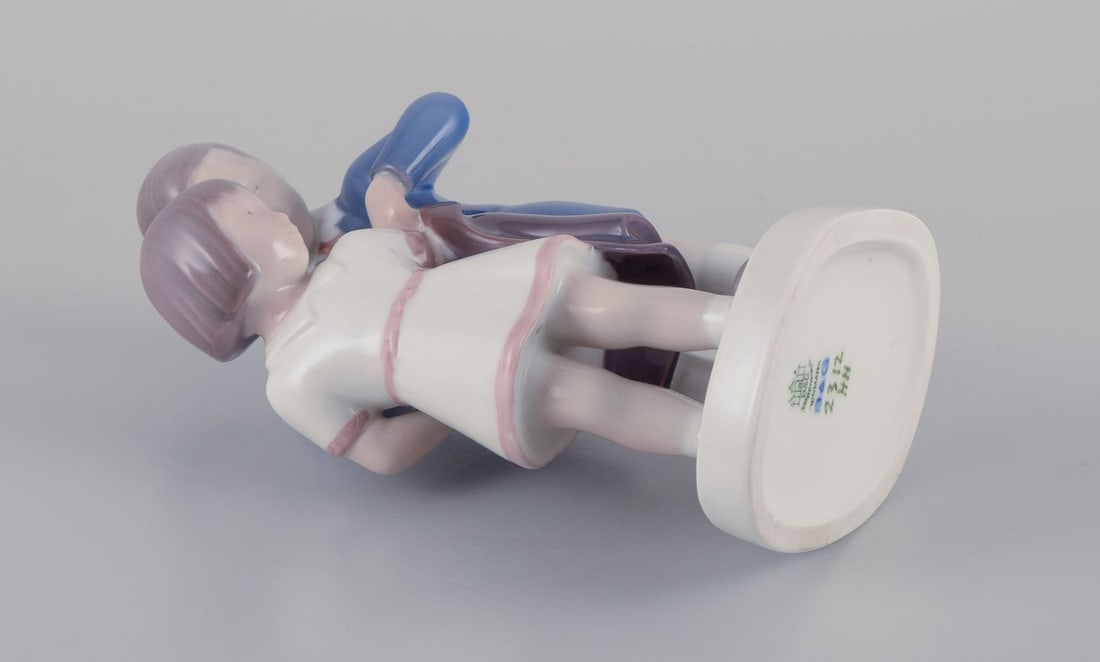 Bing & Grondahl, porcelain figurine. Boy helping girl with her jacket. Ca. 1930s - 6