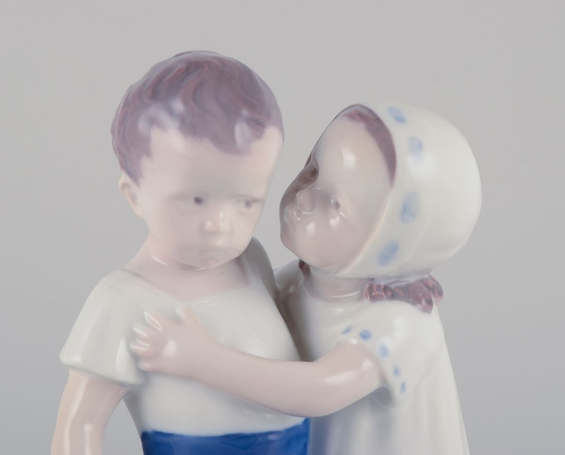 Bing & Grondahl, porcelain figurine of a little girl and boy. Approx. 1930s - 2