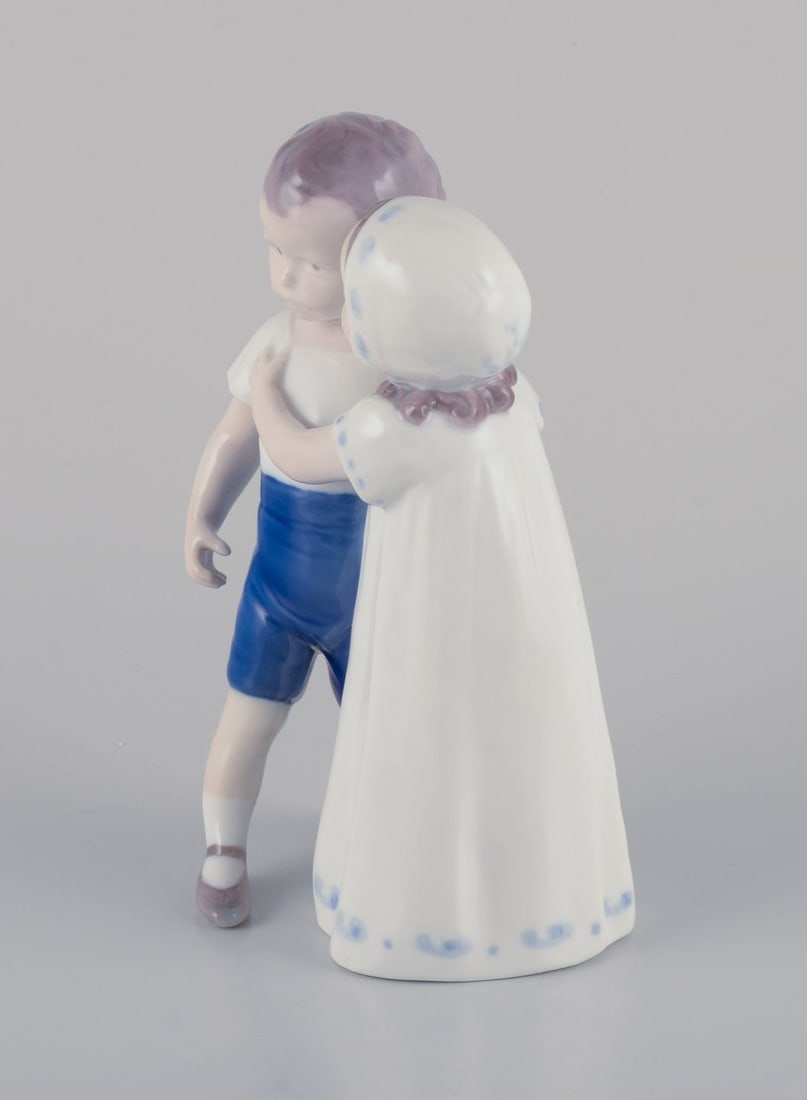 Bing & Grondahl, porcelain figurine of a little girl and boy. Approx. 1930s - 4