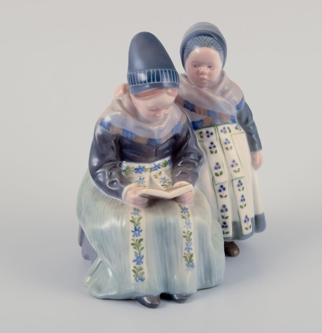 Royal Copenhagen figurine in porcelain. Two "Amager" girls in regional costume. Dated 1956 - 3