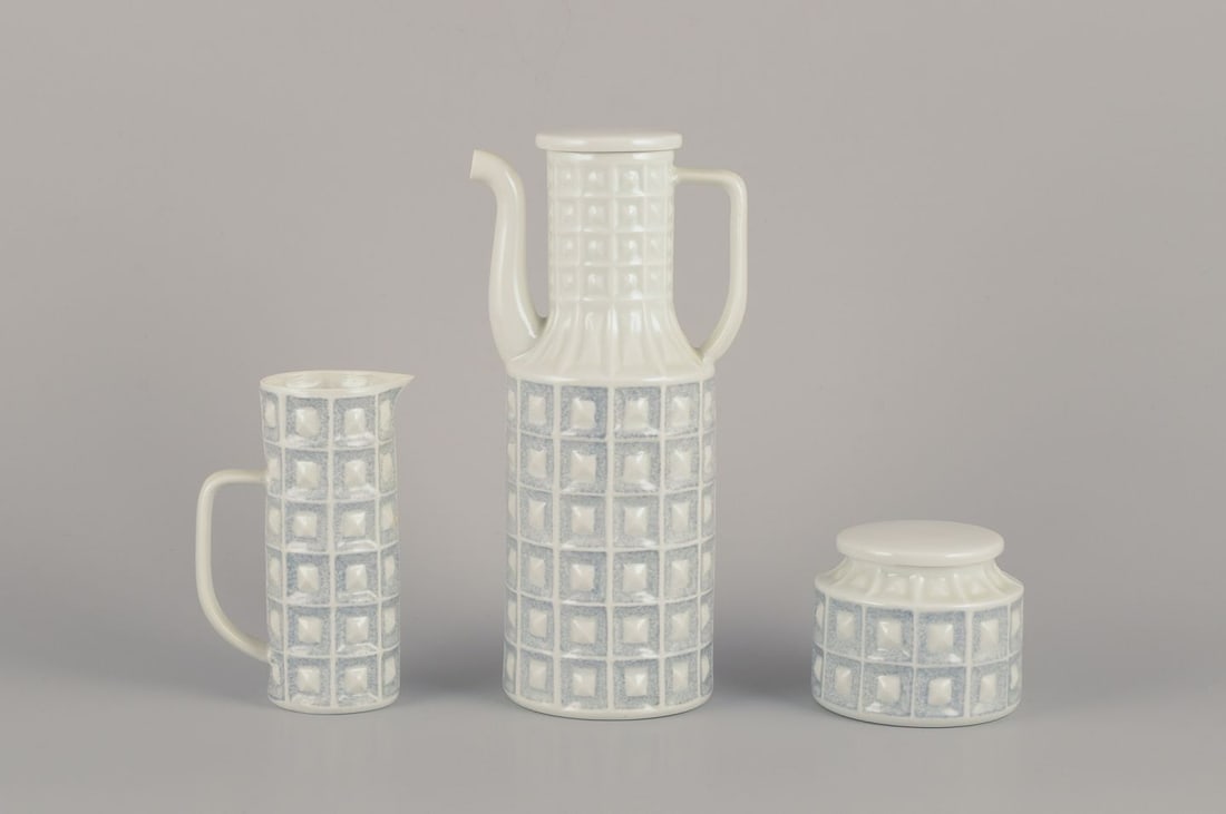 Castro, Spain. Coffee pot, sugar bowl, and creamer in gray-blue and white porcelain. Geometric: Title: "Castro", Spain. Coffee pot, sugar bowl, and creamer in gray-blue and white porcelain. Geometric pattern. 1960s/70s. Description: "Castro", Spain. Coffee pot, sugar bowl, and creamer in gray-bl
