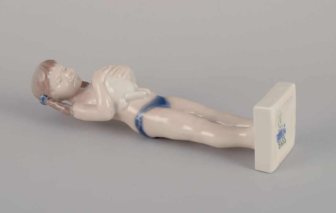 Royal Copenhagen porcelain figurine of a girl with a rabbit. 1980-1984. - 8