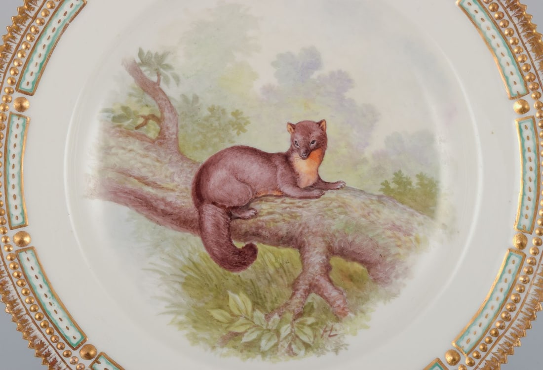 Royal Copenhagen Fauna Danica, dinner plate featuring a motif of a pine marten. Dated 1926 - 2