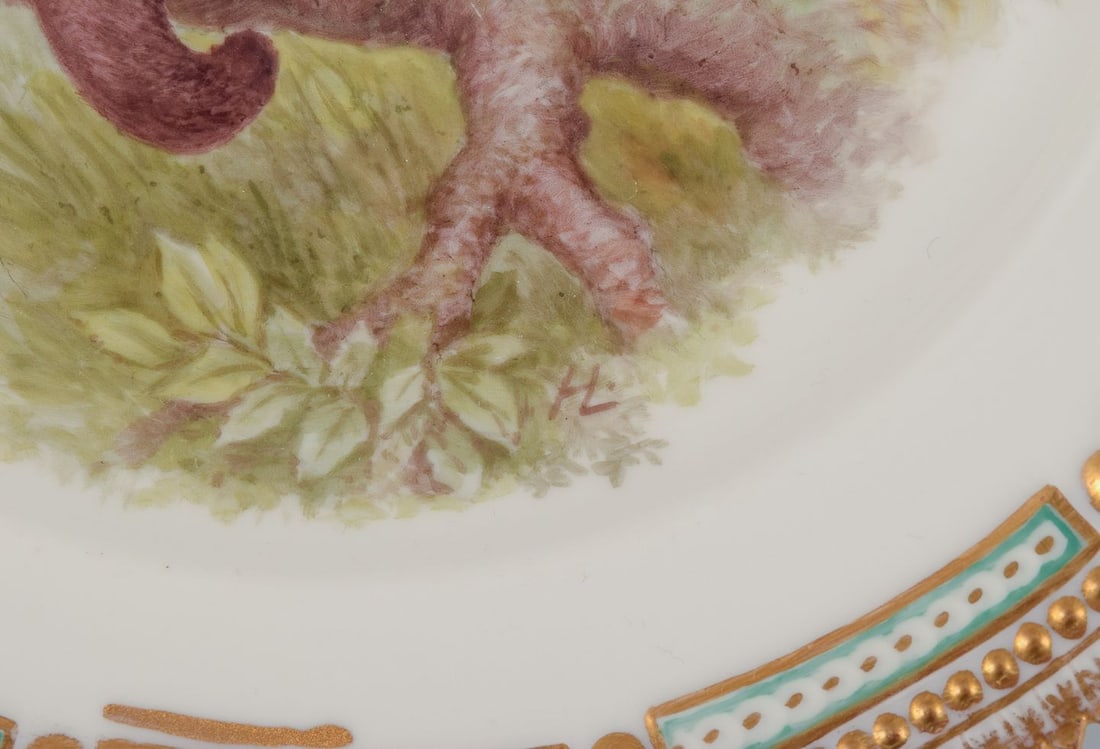 Royal Copenhagen Fauna Danica, dinner plate featuring a motif of a pine marten. Dated 1926 - 4