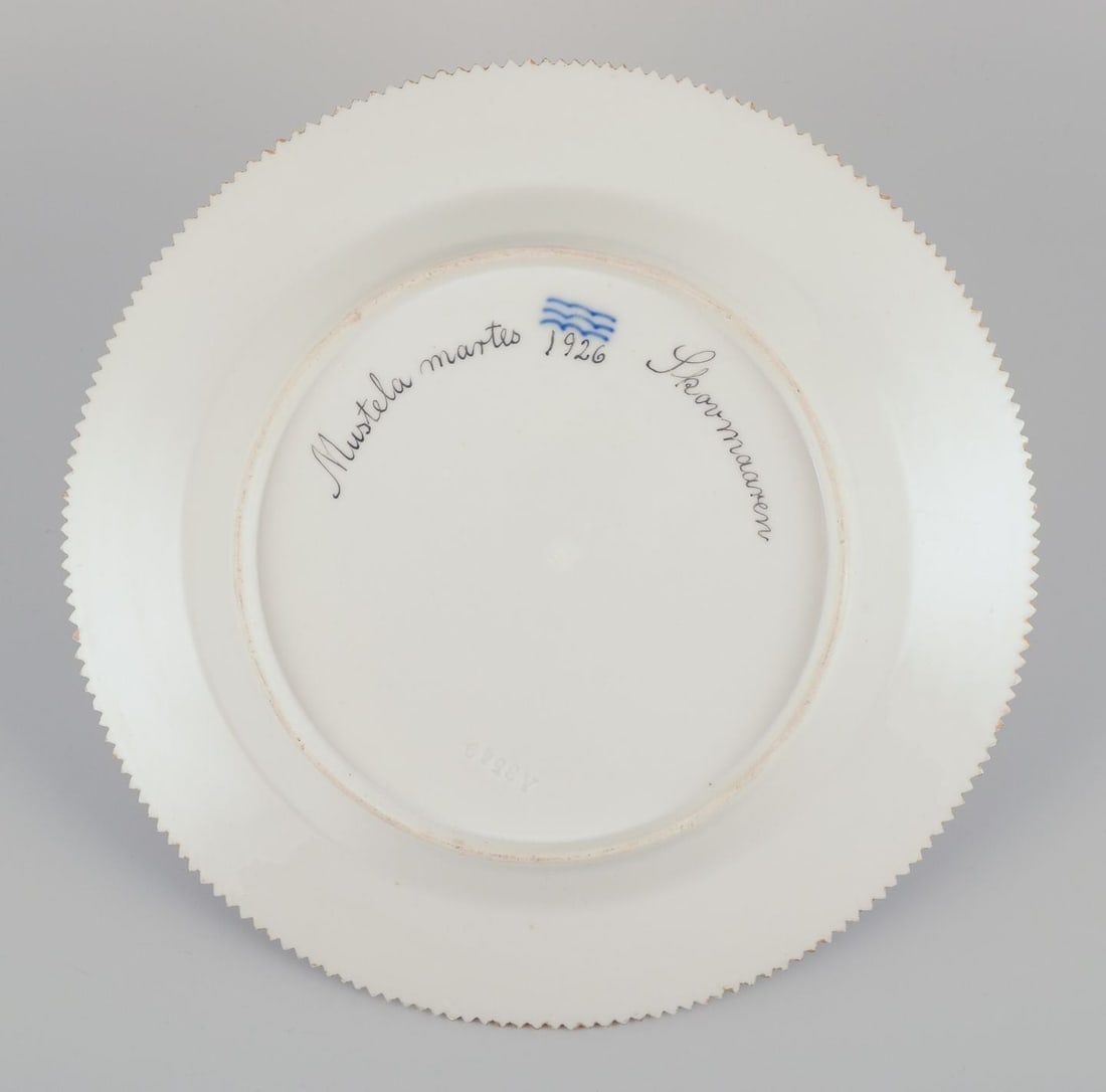 Royal Copenhagen Fauna Danica, dinner plate featuring a motif of a pine marten. Dated 1926 - 6