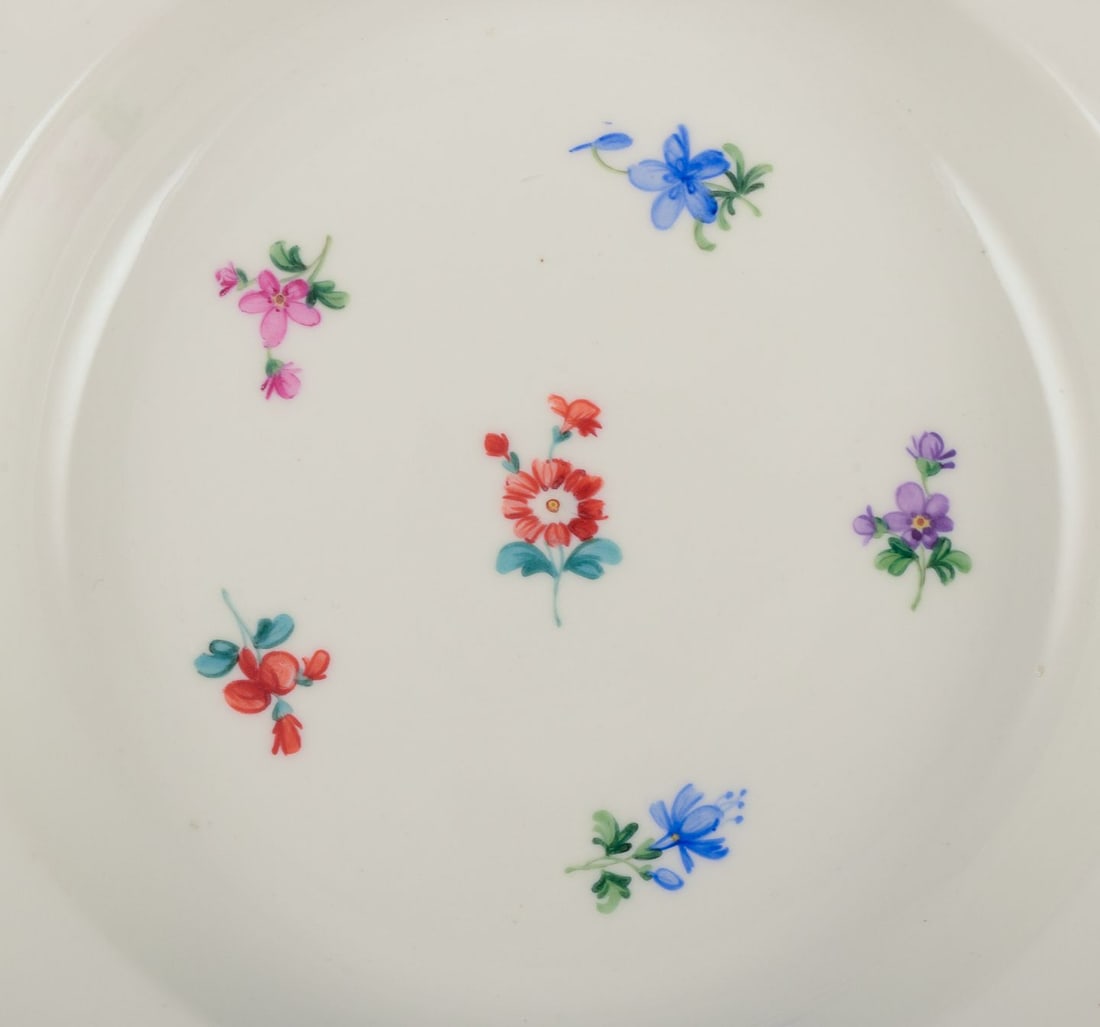 Meissen, Germany. A set of four deep plates in porcelain with polychrome floral motifs and gold rim. - 6