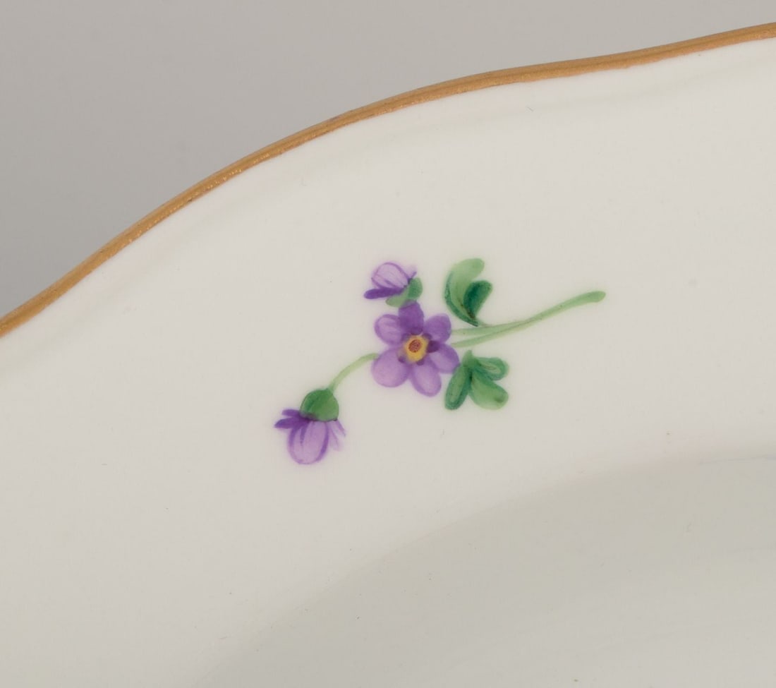 Meissen, Germany. A set of four deep plates in porcelain with polychrome floral motifs and gold rim. - 7