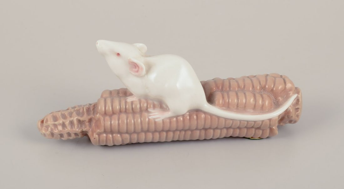 Royal Copenhagen, Denmark. Porcelain figurine of a mouse on a corn cob. Approx. 1910 - 2