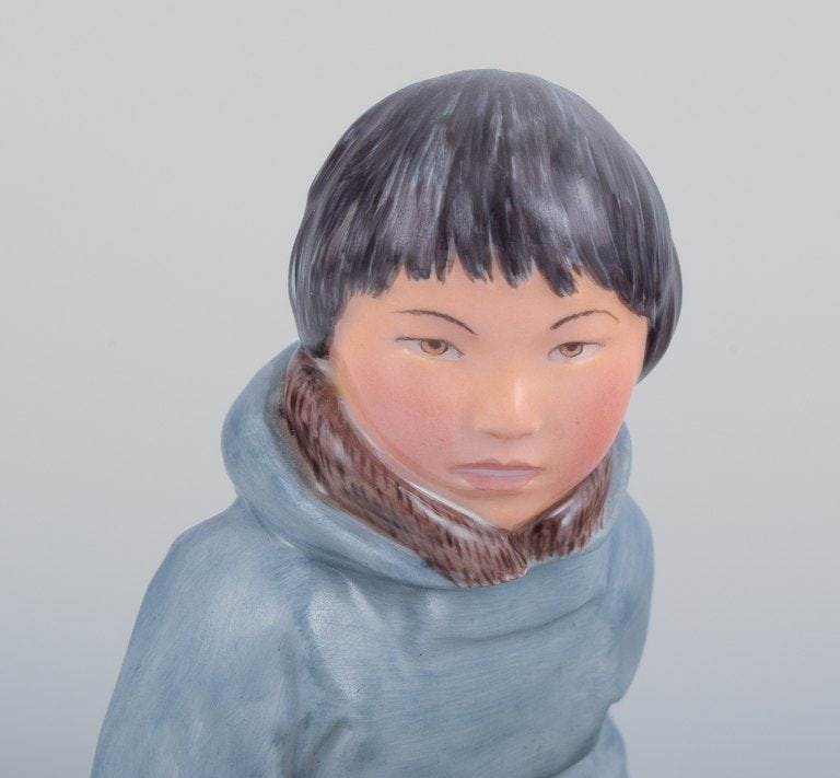 Royal Copenhagen, regional figurine of a Greenlandic boy holding a bouquet of flowers. - 4