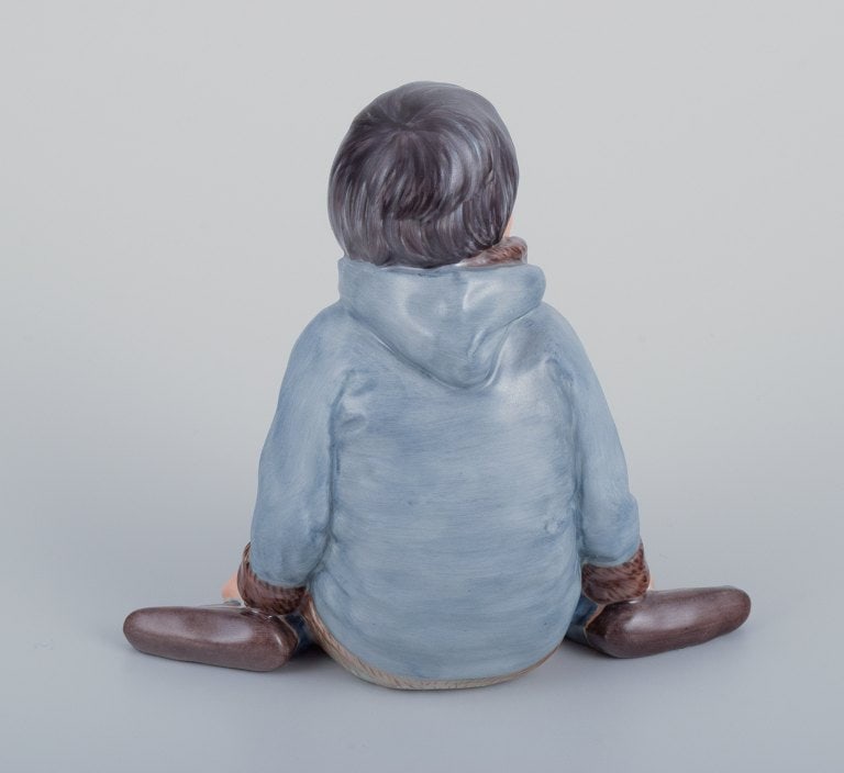 Royal Copenhagen, regional figurine of a Greenlandic boy holding a bouquet of flowers. - 5