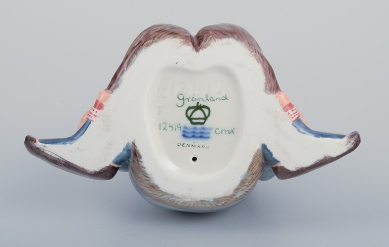 Royal Copenhagen, regional figurine of a Greenlandic boy holding a bouquet of flowers. - 7