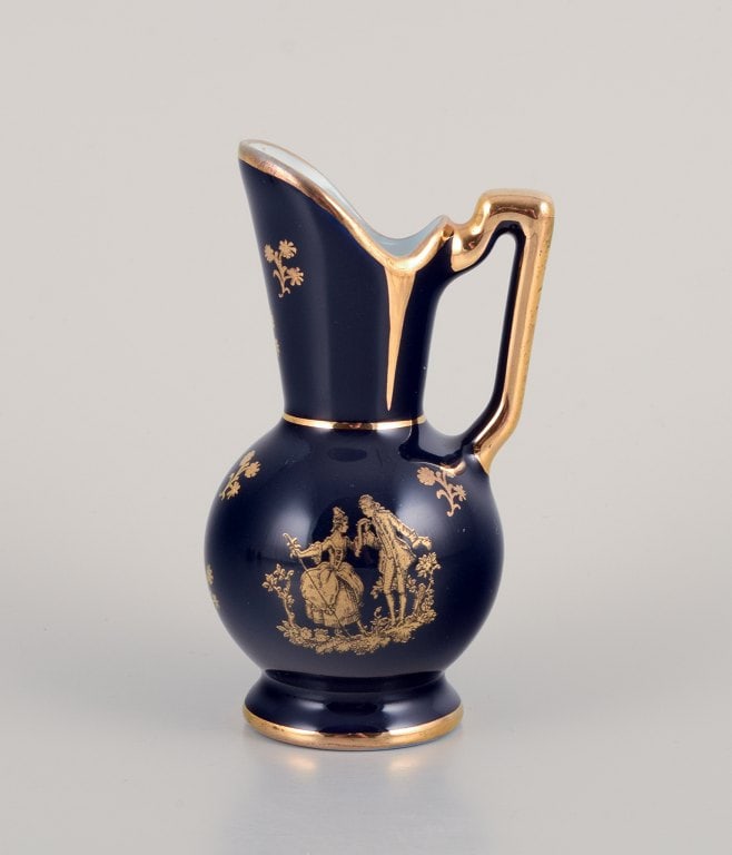 Limoges, France. Five pieces of miniature porcelain decorated with 22-karat gold leaf and beautiful - 2