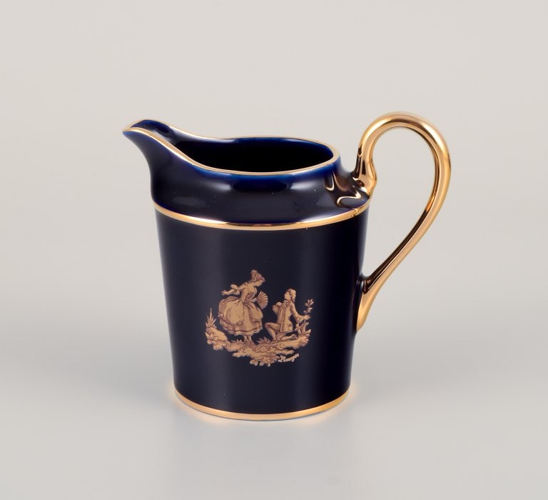 Limoges, France. Coffee cup, sugar bowl, and creamer in porcelain decorated with 22-karat gold leaf - 2