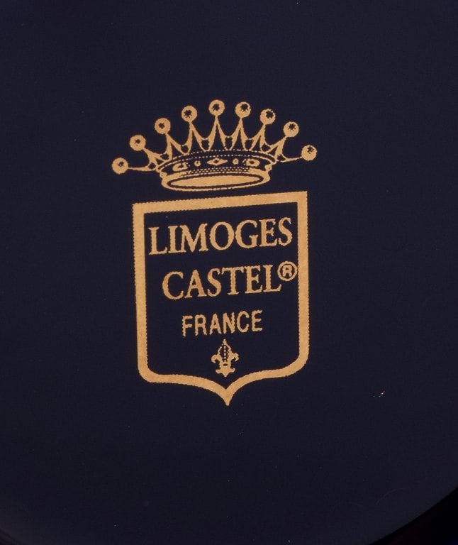 Limoges, France. Two pieces of porcelain consisting of a coffee cup and sugar bowl decorated with - 8