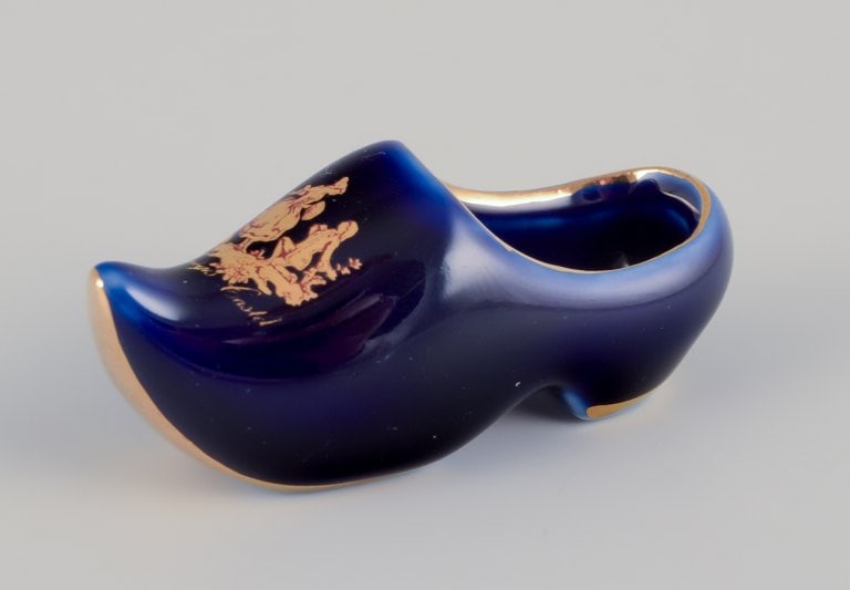 Limoges, France. Seven pieces of porcelain miniatures, decorated with 22-karat gold leaf and a - 7