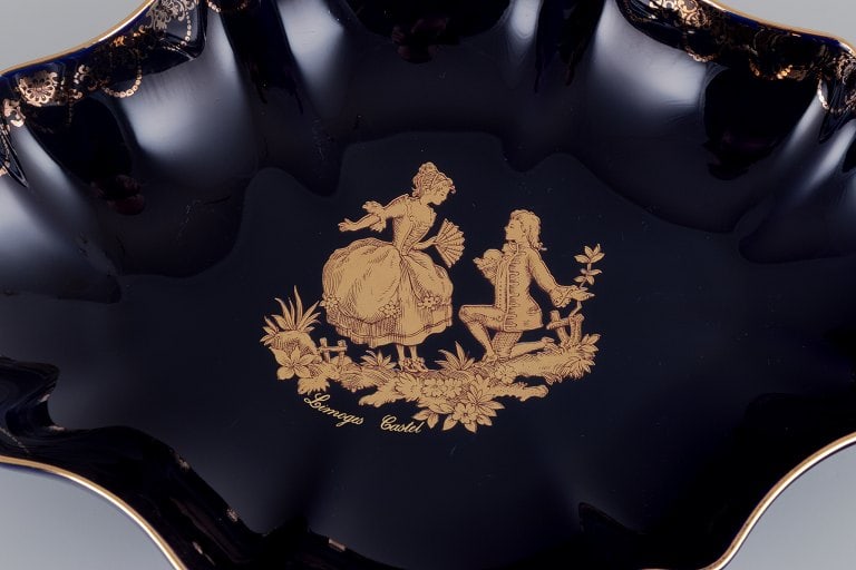 Limoges, France. Two porcelain serving platters adorned with 22-karat gold leaf and a beautiful - 6