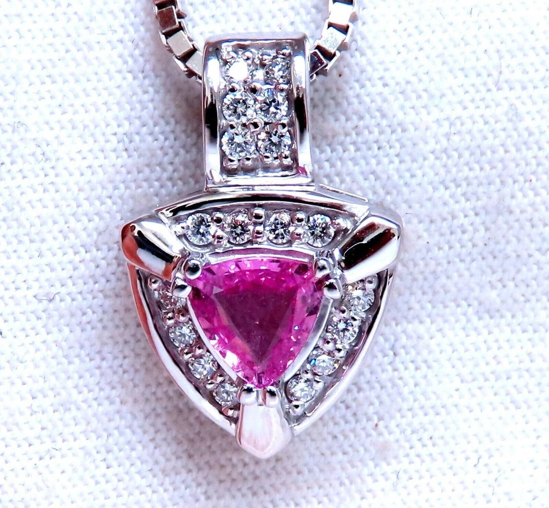 .76ct natural Trillion shaped sapphire diamonds pendant 14kt **: Title: .76ct natural Trillion shaped sapphire diamonds pendant 14kt ** Description: New with packaging PRODUCT DESCRIPTION .76ct Natural Pink Sapphire necklace. 5x5 mm .40ct natural round diamonds