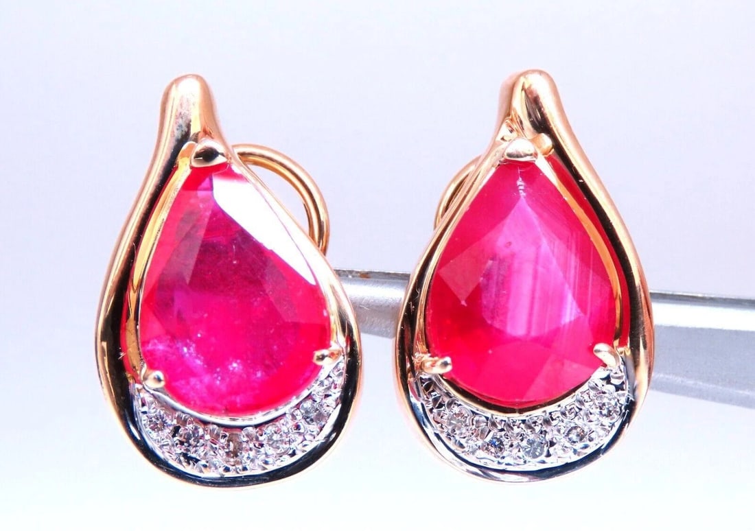 22.25ct Ruby Diamond Clip Earrings 14kt Gold**: Title: 22.25ct Ruby Diamond Clip Earrings 14kt Gold** Description: Pre-owned - Good PRODUCT DESCRIPTION Cluster Ruby Earrings. 22.25ct. Clarity Enhanced Rubies Rubies: Pear, Full Cut. Semi
