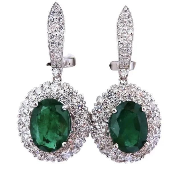 8.35ct Natural Oval Emeralds Diamond Dangle Earrings 18kt Halo Cluster 12643**: Title: 8.35ct Natural Oval Emeralds Diamond Dangle Earrings 18kt Halo Cluster 12643** Description: New with packaging PRODUCT DESCRIPTION Halo cluster dangle earrings 8.35 carat natural oval cut emera