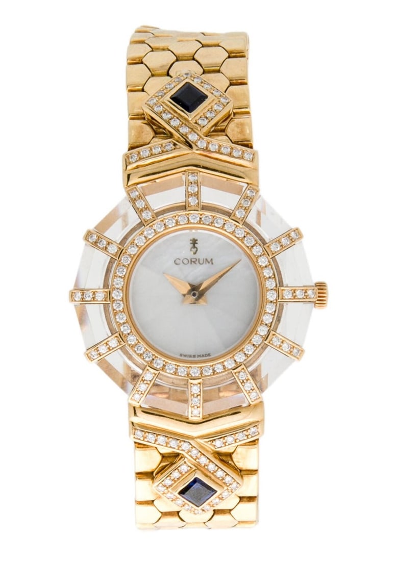 18k Gold CORUM Ladies Watch with Mother-Of-Pearl Diamonds & Sapphires 24.783.65: 18k Gold CORUM Haute Joaillerie Prism Ladies Watch with Mother-Of-Pearl Diamonds & Sapphires 24.783.65 This Ladies Corum watch is Swiss made Great present for watch collectors & enthusiasts! Rare watc
