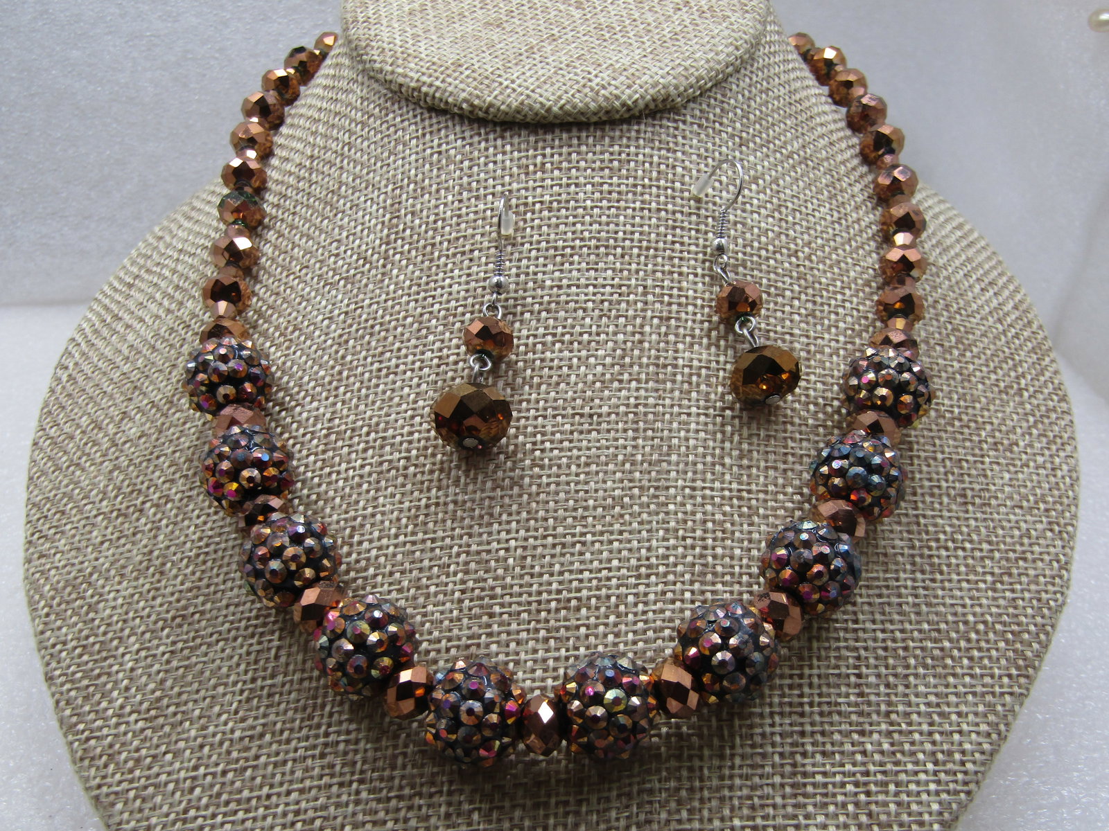 Vintage Copper Metallic Beaded Necklace & Earrings Set, 22": Vintage Copper Metallic Beaded Necklace & Earrings Set, 22". Pierced Earrings, silver tone metal. The beads are a shimmery aurora borealis type of finish to the mettalic copper tone beads. The beads a