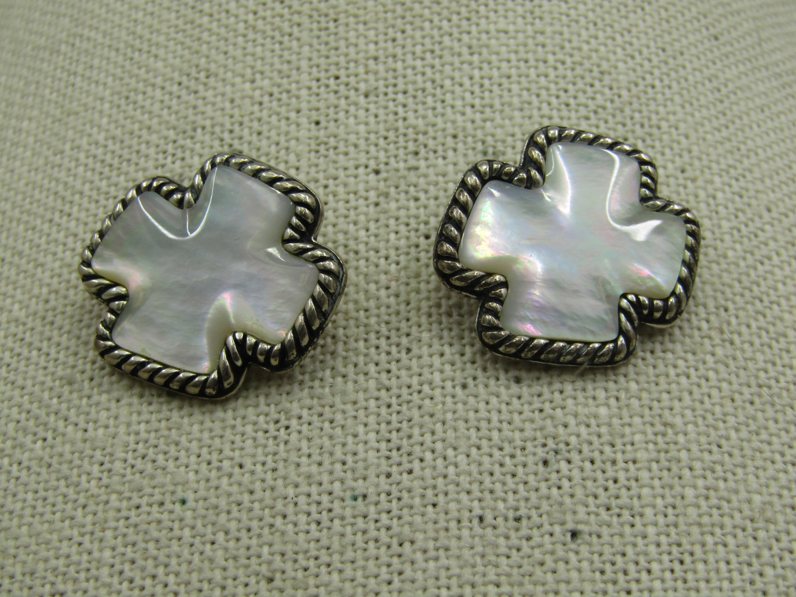 Sterling Southwestern Mother-of-Pearl Wide Cross Earrings, Carolyn Pollack Relios: Sterling Southwestern Mother-of-Pearl Wide Cross Earrings, Carolyn Pollack Relios. They are appx. 3/4" by 7/8" with a rope accent frame. Signed with the Carolyn Pollack and Relios maker's mark and