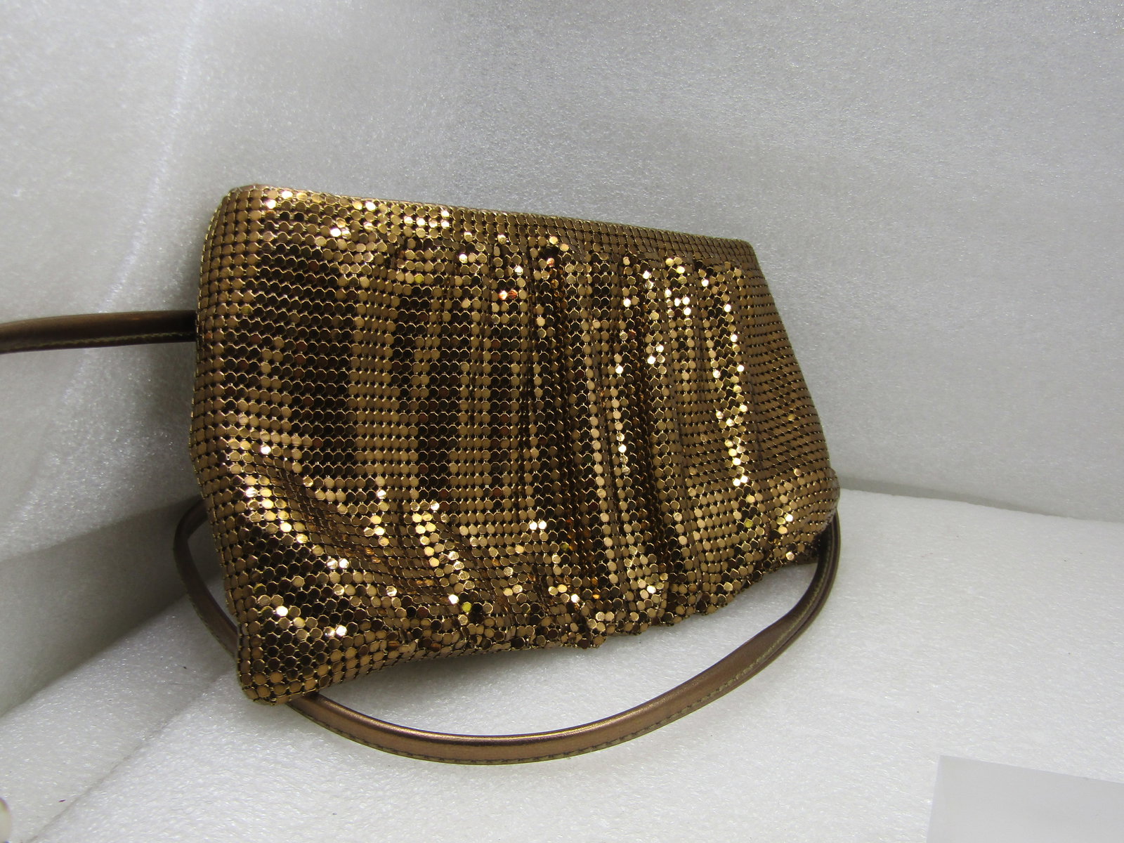 Whiting & Davis International Mesh Purse, Cross Body, Gold: Whiting & Davis International Mesh Purse, Cross Body, Dark Gold tone with long strap allowing this to be worn across the body or hanging from one shoulder. It is appx. 8" wide and 4.75" tall with a zi