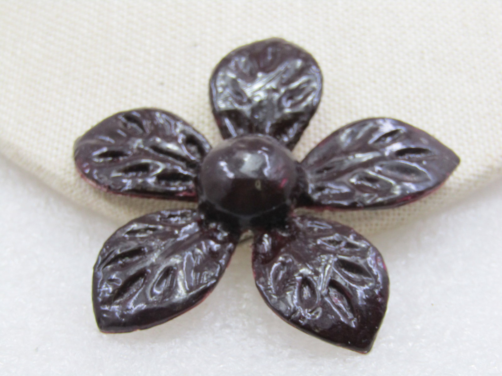 Vintage Brown Enameled Blossom Brooch Over Metal, 2.5", Mid-Century: Vintage Brown Enameled Blossom Brooch Over Metal, 2.5", Mid-Century. Heavy brown enameled over silver tone metal flower bloos with pressed veining on the petals and a rounded domed center. Dark brown