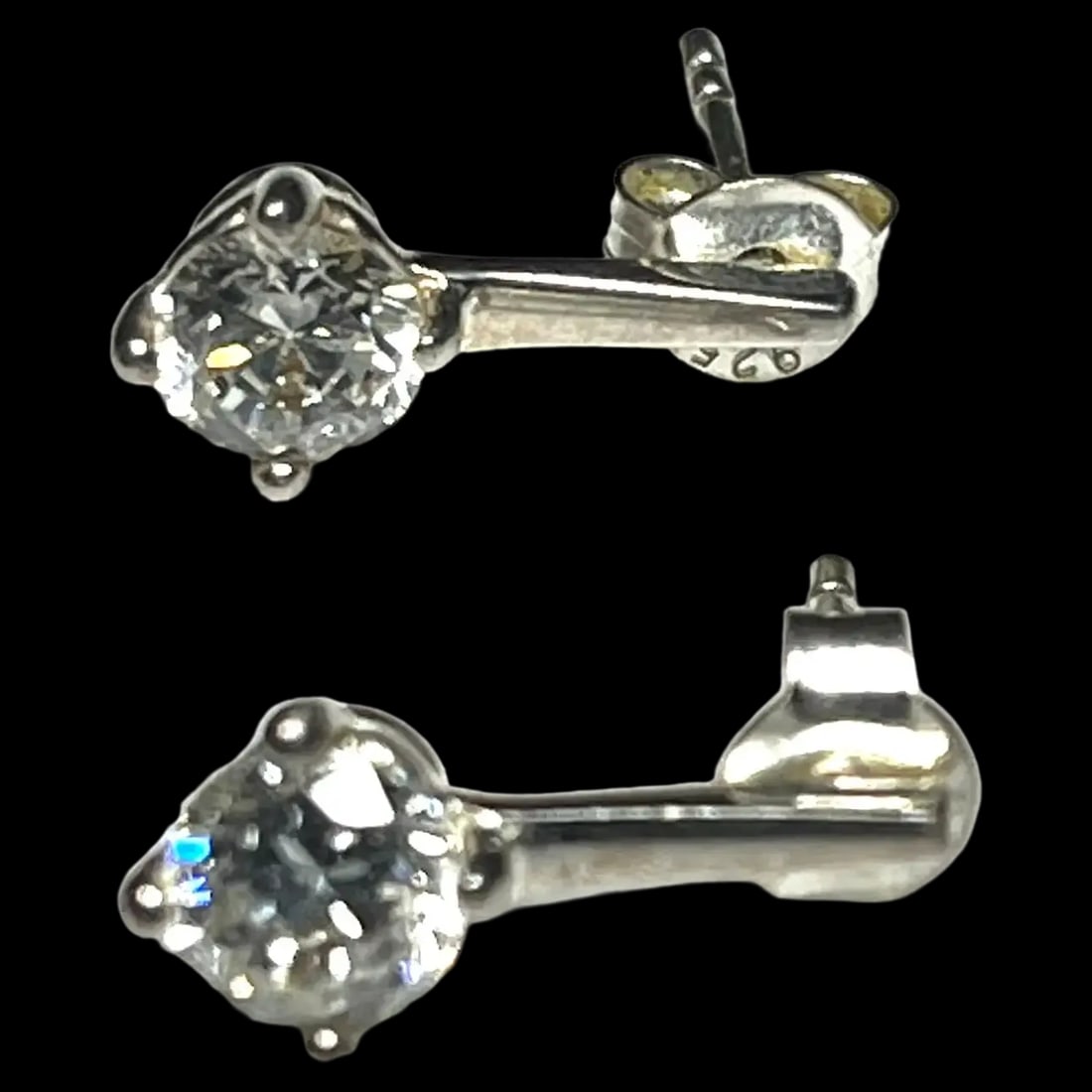 Estate Sterling Silver PK CZ 925 Earrings: Title: Estate Sterling Silver PK CZ 925 Earrings Description: Estate Sterling Silver PK CZ 925 Earrings Hallmarked- PK CZ 925Pierced EarringsWeighs 1.5 grams Date/Period: Estate Materials: Hallmarked-