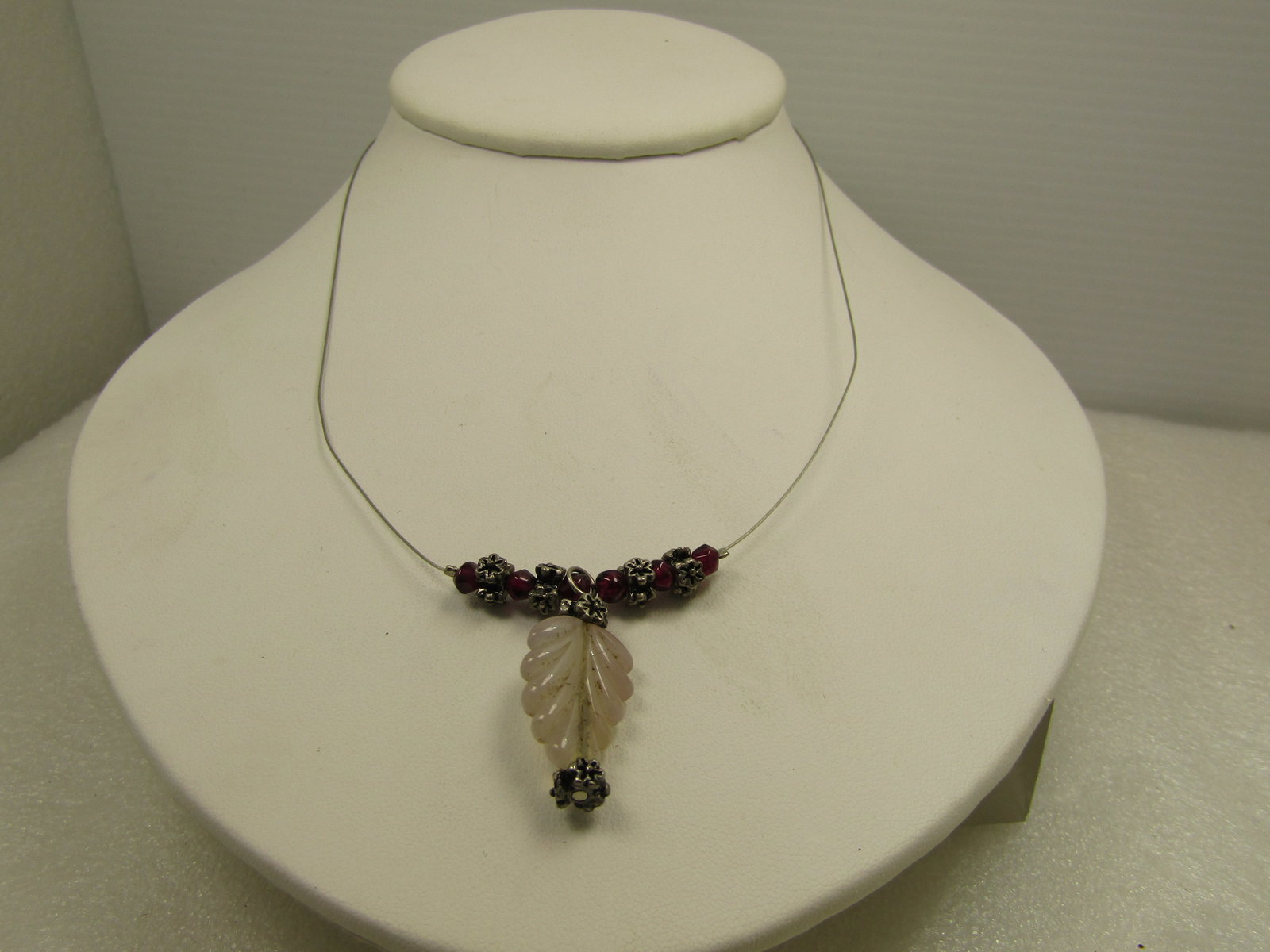 Pink Quartz & Garnet Necklace, Leaf Drop, 16", 1990's: Pink Quartz & Garnet Necklace, Leaf Drop, 16", 1990's. This has floral round silver tone beads between the six garnet beads that are an irregular shape and appx. 3mm to 4mm. Droping down from the garn