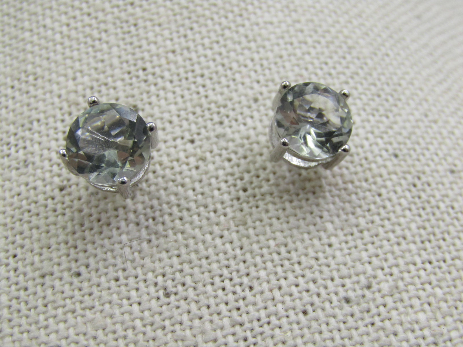 Sterling Silver Pale Green Amethyst Stud Earrings, Pierced, 1.3 CTW Each: Sterling Silver Pale Green Amethyst Stud Earrings, Pierced, 1.3 CTW Each. 8mm round pale green amethyst stone set in sterling silver. They are marked .925 with an S in front. Tested. Weight of the