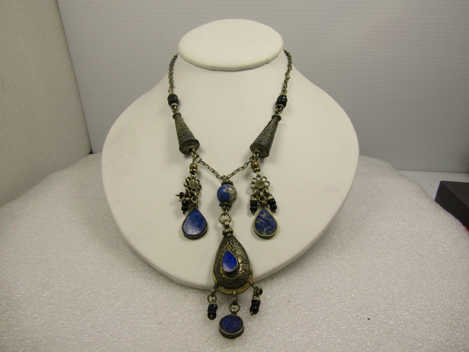 Vintage Sodalite Onyx Dangle Necklace, 15", Afghan/Berber/Etnic Appeal, 1940's-1960's: Vintage Sodalite Onyx Dangle Necklace, 15", Estimated at 1940's-1960's. Afghan/Berber/Etnic Appeal. Kuchi themed. This has tapered elongated tubular metal beads with a design in the chain of the neckl