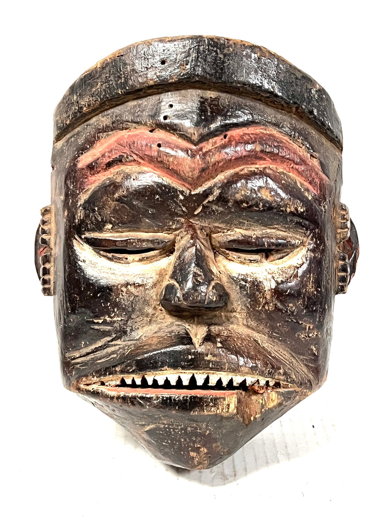 Bacongo Mask: Title: Bacongo Mask Date/Period: Late 20th Century Description: African Tribal Art Bacongo Mask Materials: Wood Size: 9" h x 8" w Reserve: $200.00 Shipping:Domestic: Flat-rate of $30.00 to anywhere