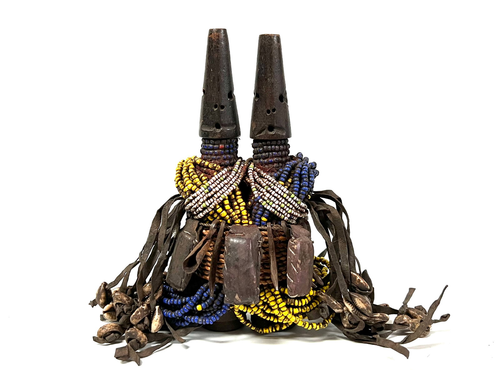 Double Head Ibeji Beaded Doll: Title: Double Head Ibeji Beaded Doll Date/Period: Late 20th Century Description: African Tribal Art Double Head Ibeji Beaded Doll Materials: Wood Size: 9" h x 9" w Reserve: $300.00 