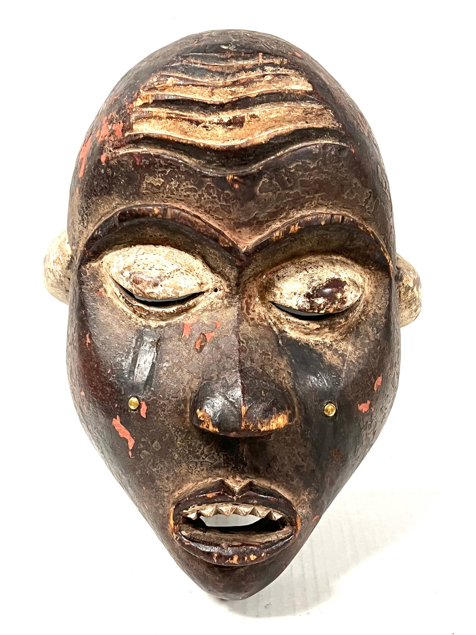 Bacongo Mask: Title: Bacongo Mask Date/Period: Late 20th Century Description: African Tribal Art Bacongo Mask Materials: Wood Size: 12" h x 9" w Reserve: $180.00 Shipping: Domestic: Flat-rate of $30.00 to anywhere