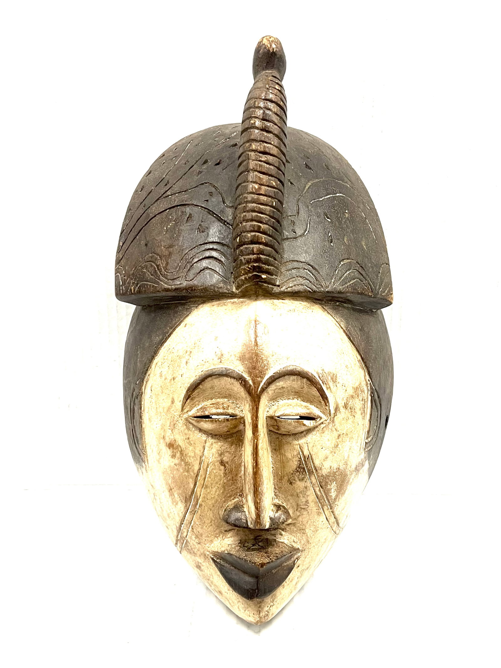 Kwele Mask: Title: Kwele Mask Date/Period: Late 20th Century Description: African Tribal Art Kwele Mask Materials: Wood Size: 15" h x 8.5" w Reserve: $180.00 Shipping: Domestic: Flat-rate of $30.00 to anywhere w