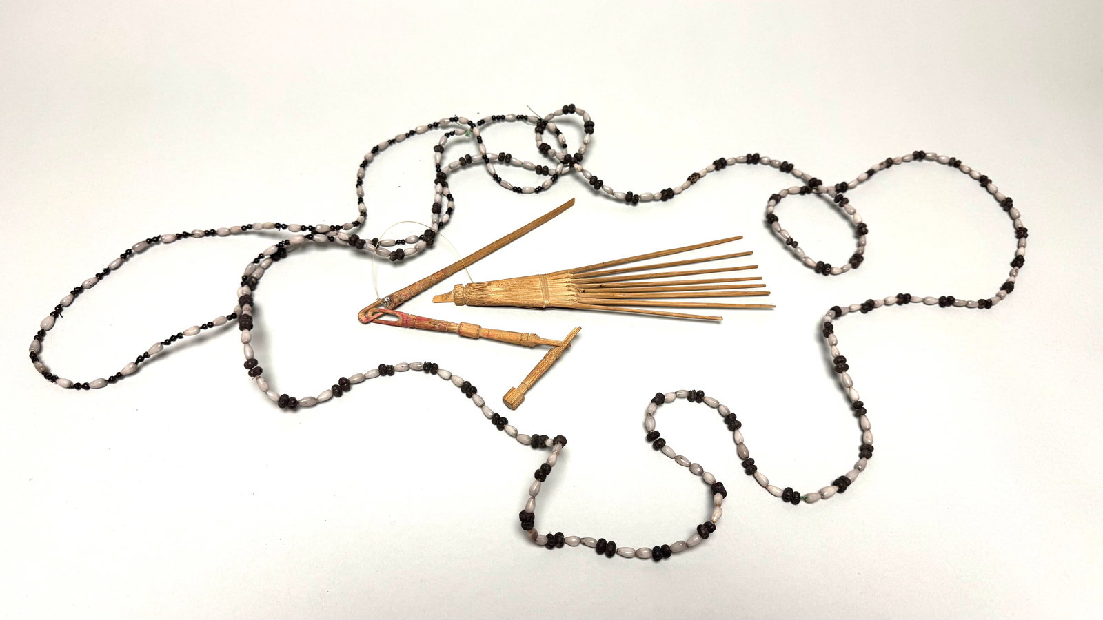 2 Papua necklace and hair comb tribal use: Title: 2 Papua necklace and hair comb tribal use Description: Made of seeds these 2 necklaces and wooden hair comb, Papua new Guinea. Combined shipping possible. Reserve: $50.00 Shipping:Domestic: