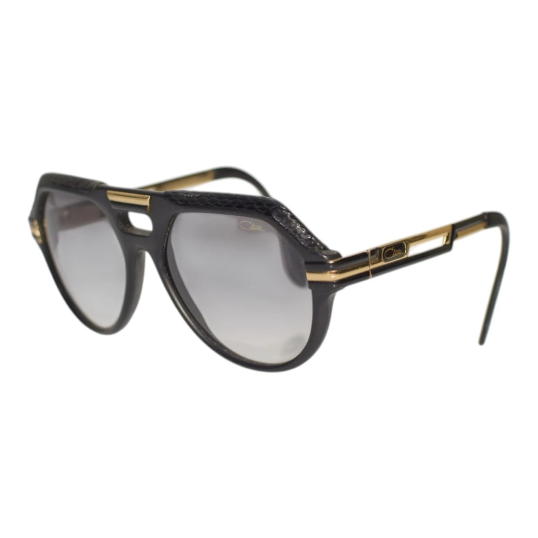 Cazal Arc en Ciel 657 /3 Aviator Black & Gold Leather Trim Sunglasses: Title:Cazal Arc en Ciel 657 /3 Aviator Black & Gold Leather Trim Sunglasses Description:Cazal Arc en Ciel 657 /3 Aviator Black & Gold Leather Trim Sunglasses Creating an unexpected twist on a timeless