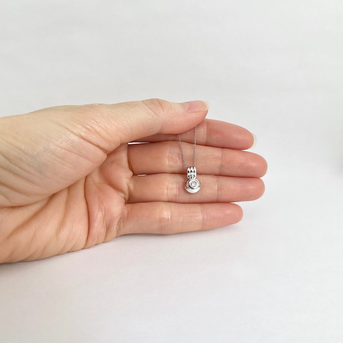 Round Bezel-Set Solitaire Diamond Pendant Necklace 14K White Gold .07 CT - 3