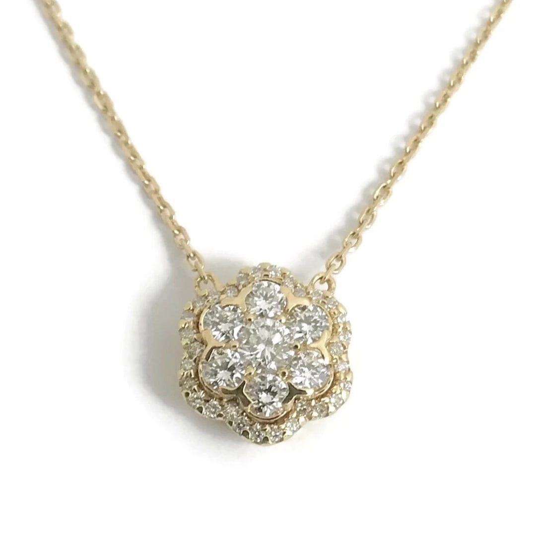 Round Diamond Flower Cluster Halo Pendant Necklace 14K Yellow Gold, .93 CTW: Title: Round Diamond Flower Cluster Halo Pendant Necklace 14K Yellow Gold, .93 CTW Description: Round Diamond Flower Cluster Halo Pendant Necklace 14K Yellow Gold, .93 CTW Make a statement with this g