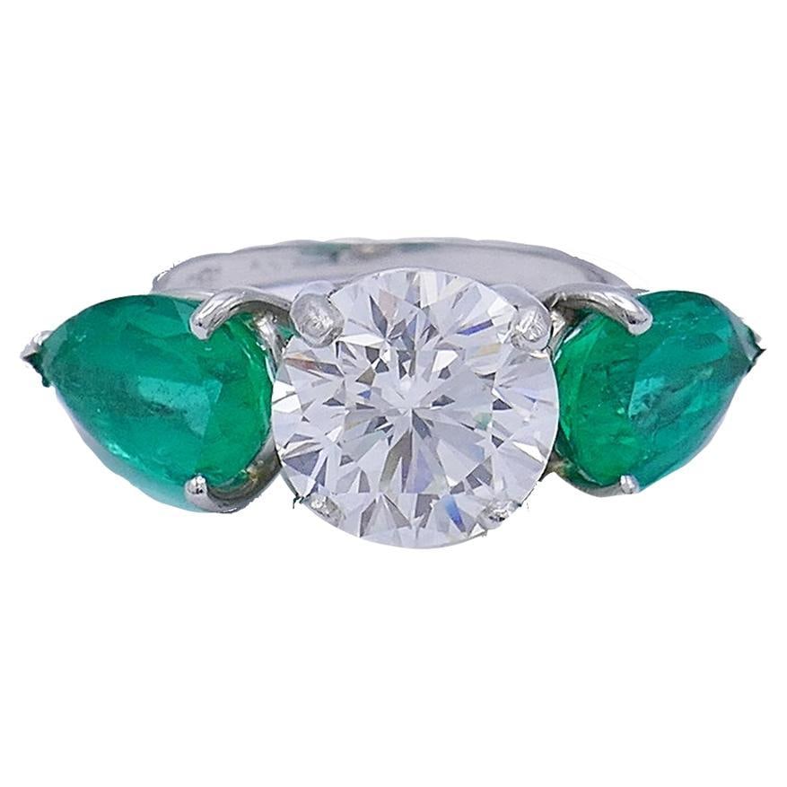 Platinum Emerald Diamond Three-Stone Ring 3.01-ct GIA Report: Title: Platinum Emerald Diamond Three-Stone Ring 3.01-ct GIA Report Description: About the Item A dazzling diamond emerald platinum ring. This timeless ring has a classic three stone design often used