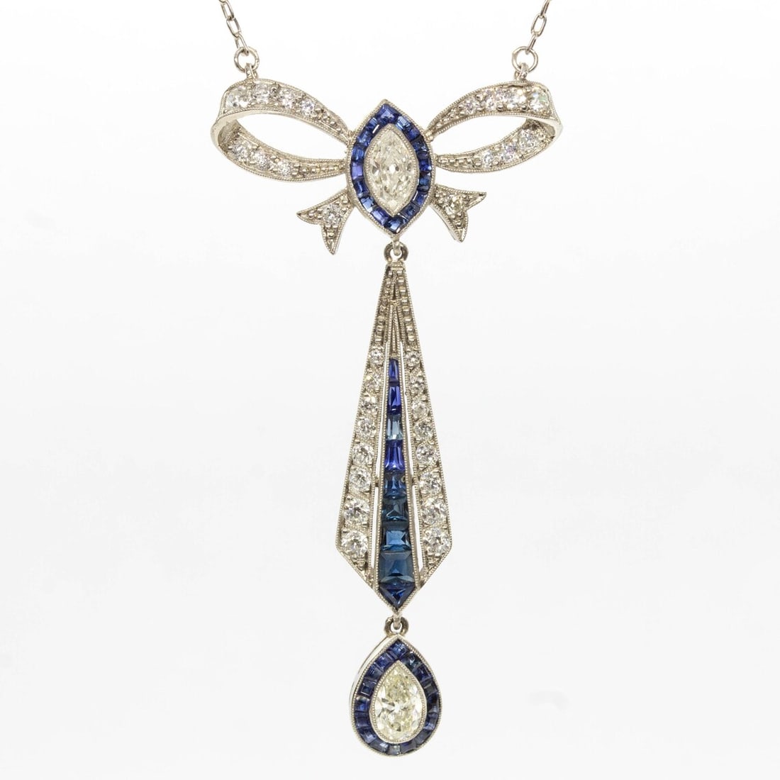 Art Deco Platinum French Cut Sapphire and Natural Diamond Pendant: Title: Art Deco Platinum French Cut Sapphire and Natural Diamond Pendant Description: Title: Art Deco Platinum French Cut Sapphire and Natural Diamond Pendant Description: Vintage from the 1920s Mater