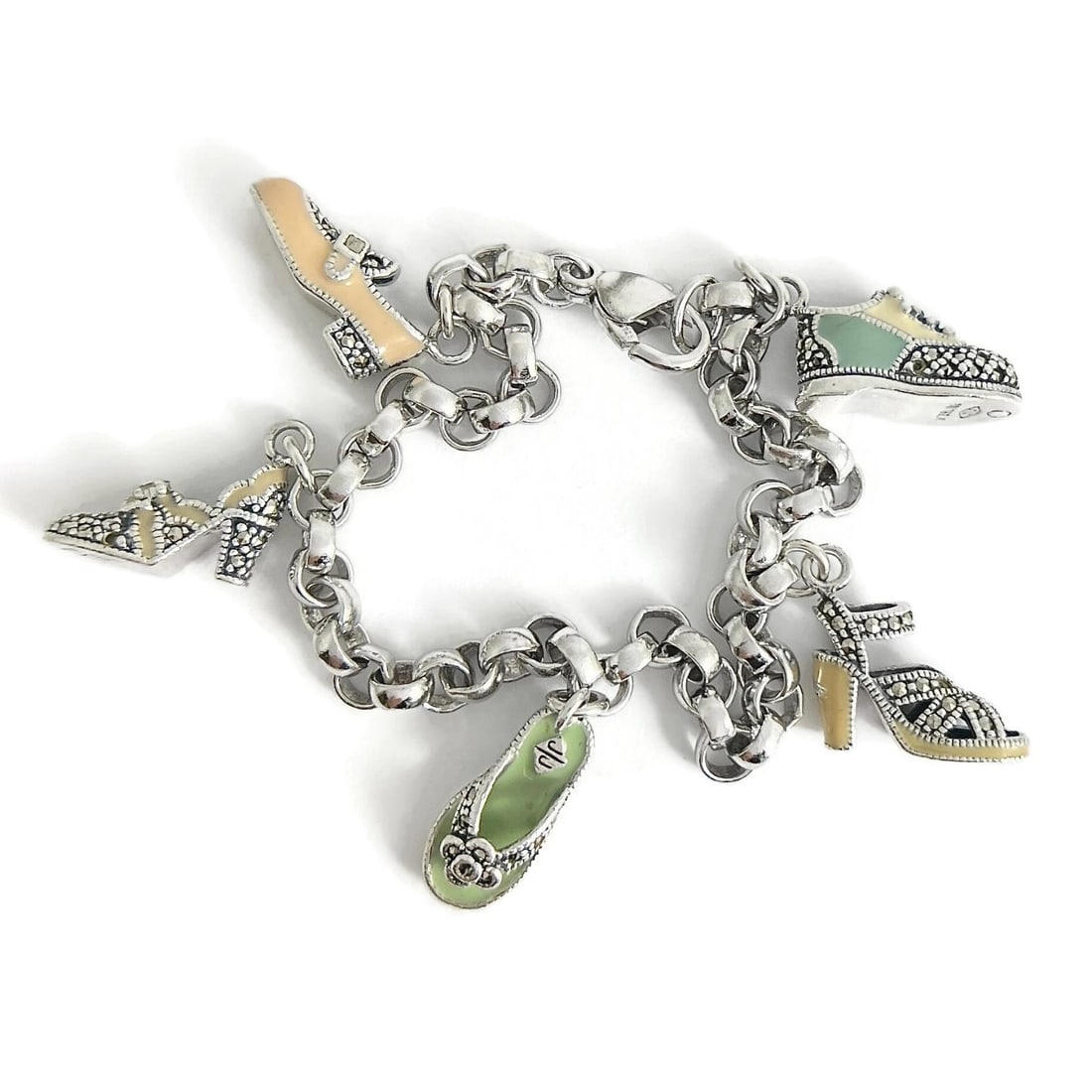 Vintage Judith Jack Enamel Shoe Charm Bracelet Sterling Silver, 27.47 Grams: Title: Vintage Judith Jack Enamel Shoe Charm Bracelet Sterling Silver, 27.47 Grams Description: Vintage Judith Jack Enamel Shoe Charm Bracelet Sterling Silver, 27.47 Grams This is such a unique bracel